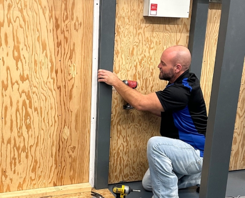 Training to install elevator smoke curtain
