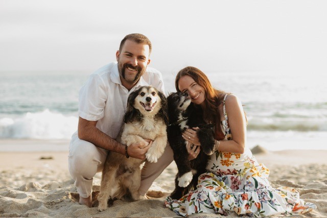 Connor with his wife and two dogs